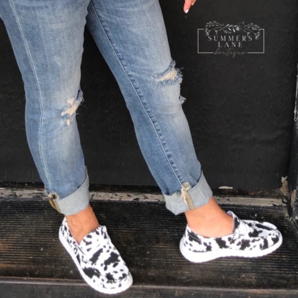 NWT BLACK & WHITE CANVAS COW PRINT SLIP ON SNEAKERS SIZE 7